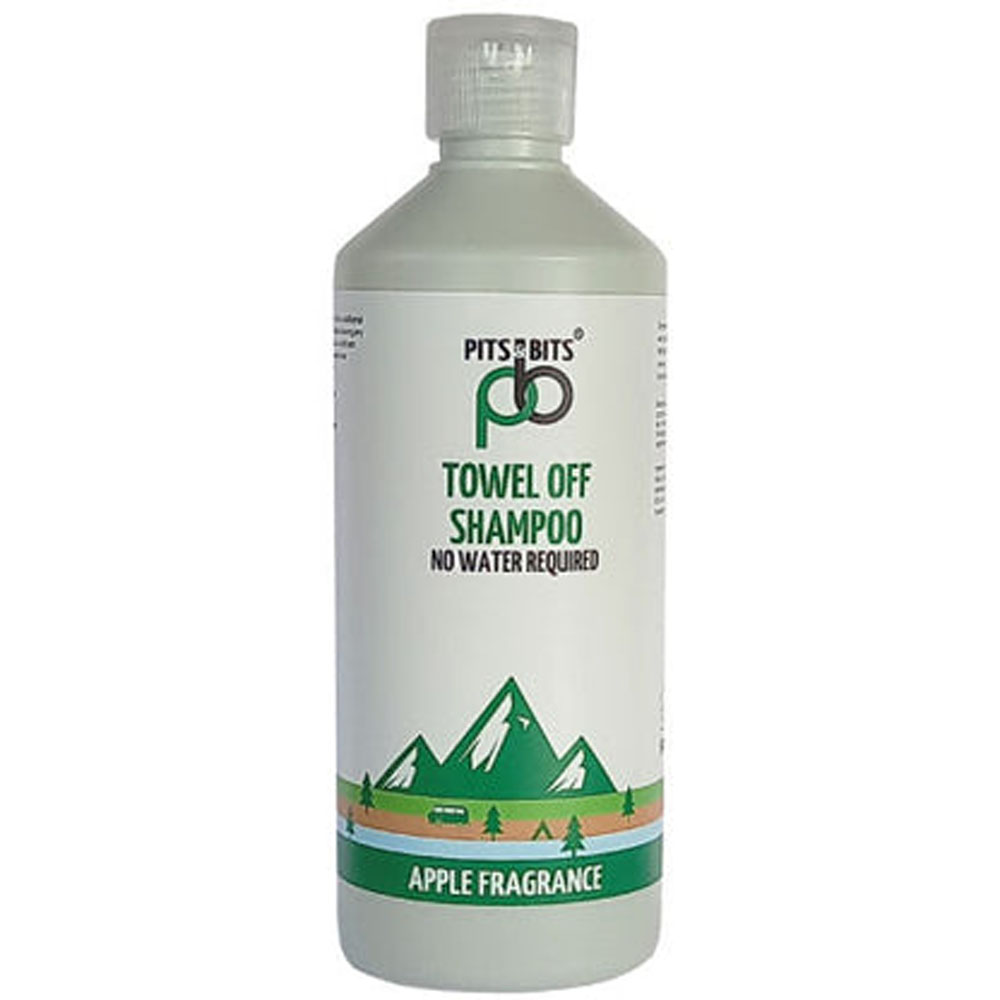 Front view of Pits & Bits no-rinse shampoo bottle with green apple fragrance label and mountain illustration