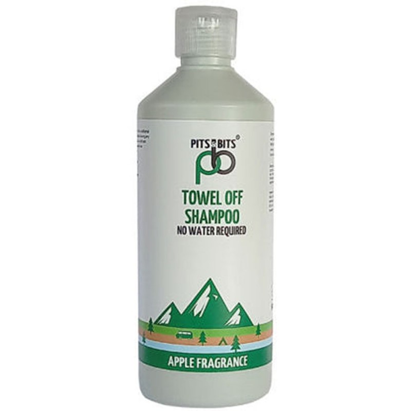 Front view of Pits & Bits no-rinse shampoo bottle with green apple fragrance label and mountain illustration