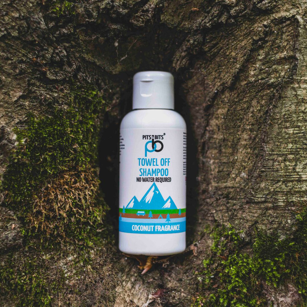 Front view of Pits & Bits Towel Off Body Wash bottle with pink antibacterial label