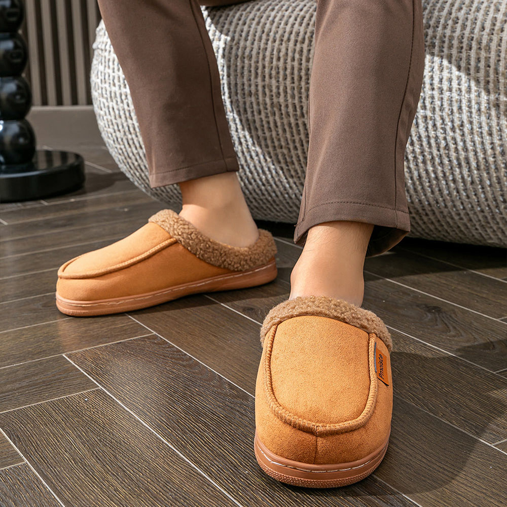 Men’s soft faux suede house slippers in brown with plush fleece lining and cushioned sole designed for warm indoor comfort and everyday home wear