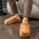 Men’s soft faux suede house slippers in brown with plush fleece lining and cushioned sole designed for warm indoor comfort and everyday home wear