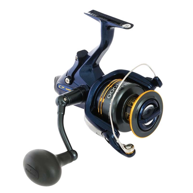 Close-up of Shimano Thunnus CI4 4000 fishing reel featuring ergonomic handle and smooth finish.