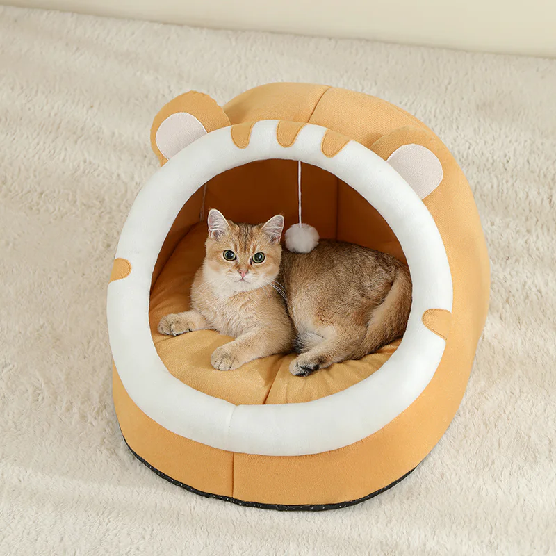 Large warm enclosed cat bed and pet house with cushioned interior and hanging toy