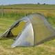 Terra Nova Solar Ultra 2 tent fully pitched on grassy field, showing both flysheet and inner tent in daylight.