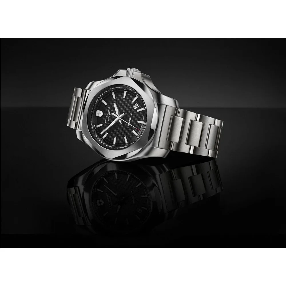 Victorinox I.N.O.X. Mechanical Automatic Watch featuring a 43mm stainless steel case, matching stainless steel bracelet, and sophisticated black dial with luminous hands and hour markers. Powered by a self-winding automatic mechanical movement, this Swiss