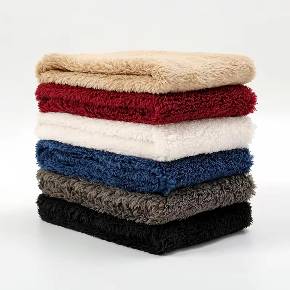 Stacked plush fleece loop neck gaiters showing soft faux fur fabric texture for winter warmth and comfort