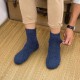Five pack of winter merino wool thermal socks in navy blue designed for hiking, cold weather, outdoor work and everyday winter comfort