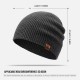 Dark gray knitted winter beanie showing stretchable fit dimensions suitable for head circumference 53 to 62 centimeters