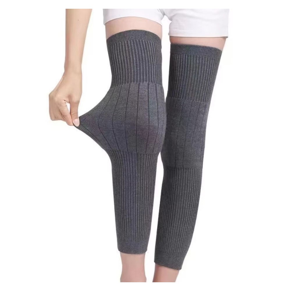 Gray knitted plush knee warmers with stretch fit design for warmth comfort and leg support during winter