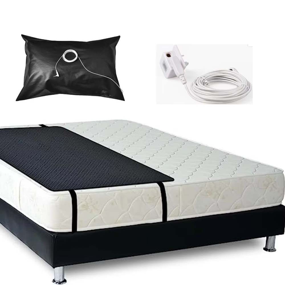 Conductive leather grounding mat and pillow cover shown on a mattress with cord and plug setup