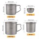 A stackable titanium tea cup set including a 600ml mug, 400ml mug, tea infuser, and two small tea cups.