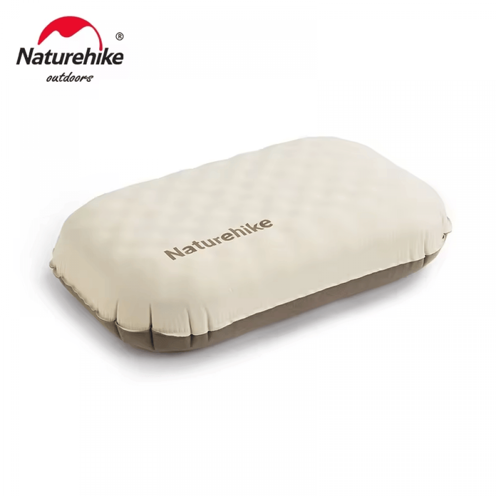 Close-up image of the Naturehike Feather Bone 2-in-1 inflatable pillow in champagne brown color, showing its soft, contoured design for camping or travel comfort.