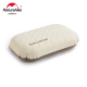 Close-up image of the Naturehike Feather Bone 2-in-1 inflatable pillow in champagne brown color, showing its soft, contoured design for camping or travel comfort.