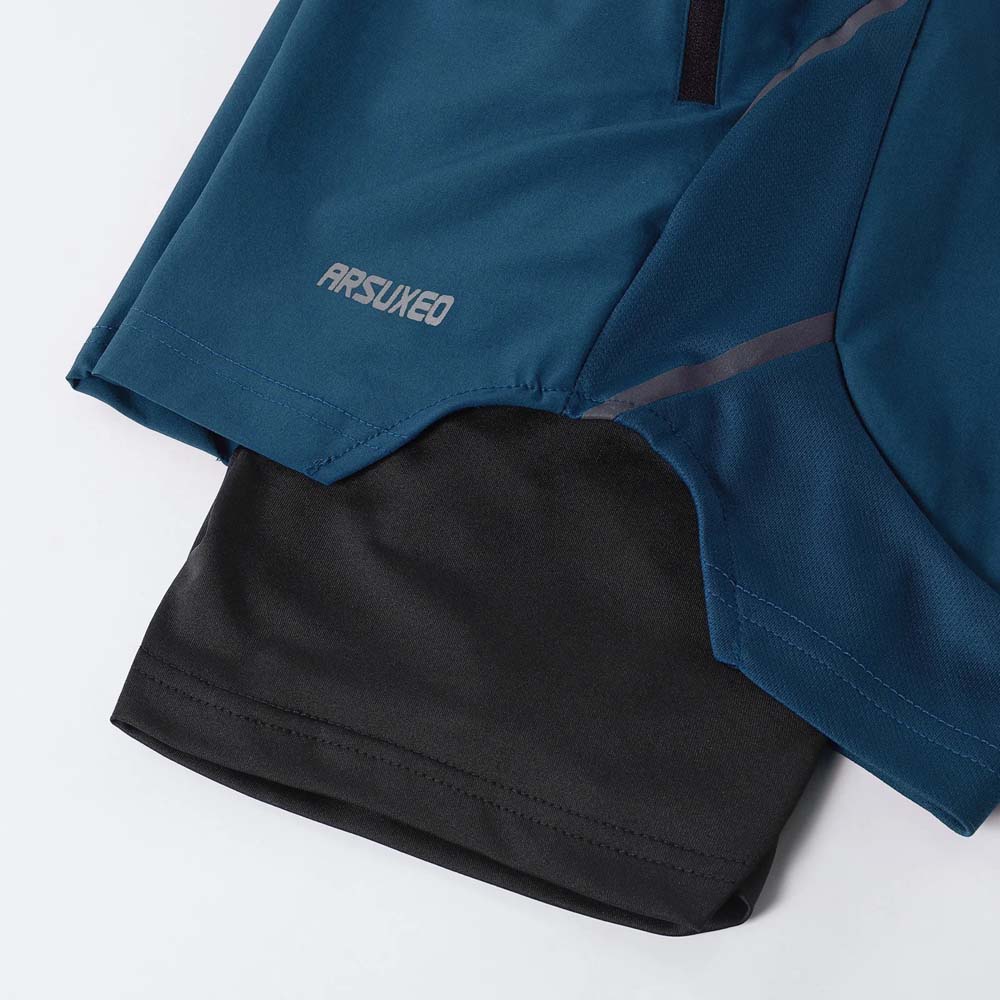 ARSUXEO 2-in-1 men’s running shorts in blue with black compression liner, showing lightweight hem and reflective strip.