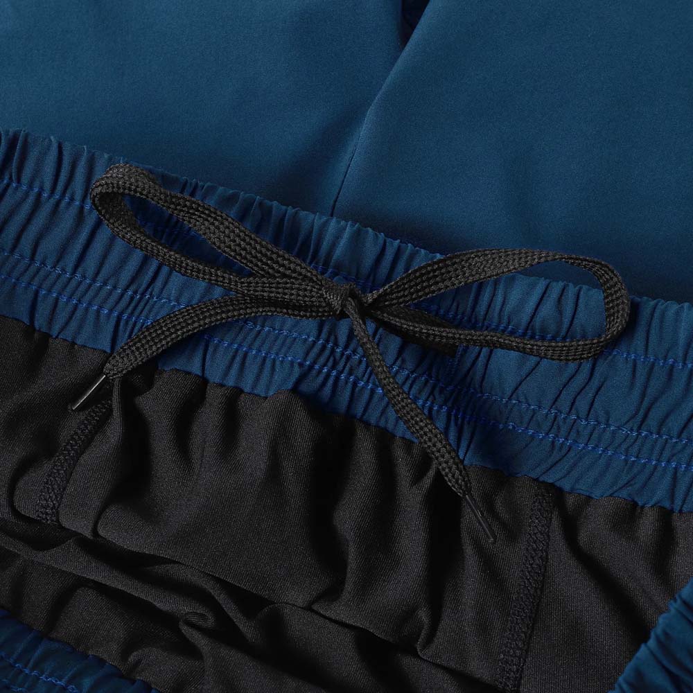 Close-up of ARSUXEO men’s 2-in-1 workout shorts waistband, featuring adjustable drawstring for secure fit.