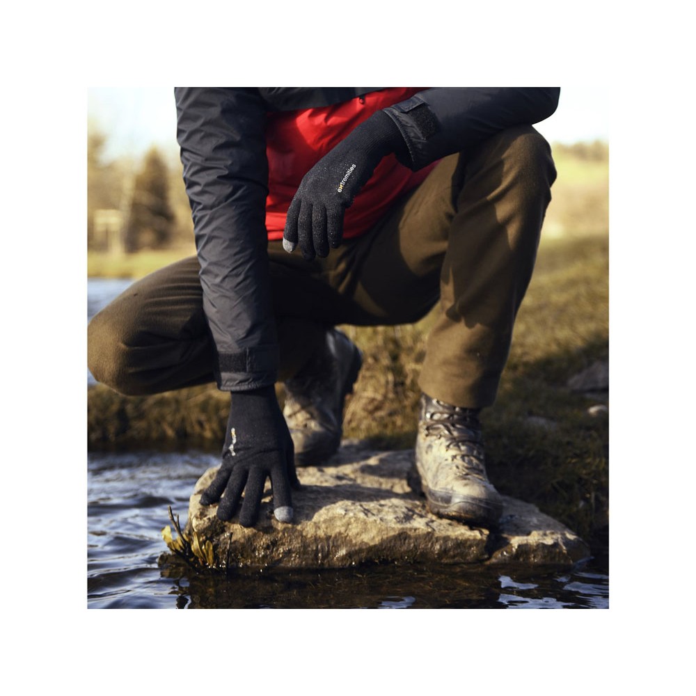 Black Extremities glove with grey touchscreen tips on thumb and two fingers, shown flat with logo on back of hand.