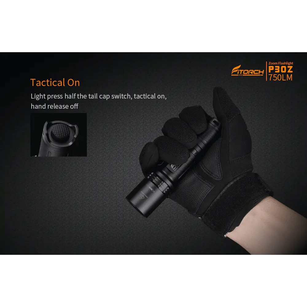 Angled view of the black Fitorch P200 flashlight with side button and large head