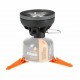 Jetboil Flash Camping Cooker – Carbon Black Sleeve with Stove Base Jetboil Flash camping stove with black carbon sleeve, Jetpower fuel canister, and orange stabilizer legs
