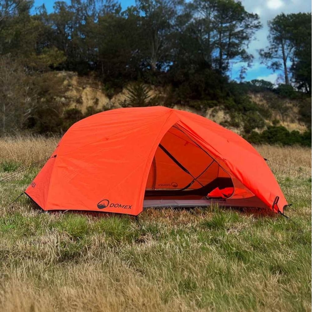 Domex Scout lightweight 2-3 person backpacking dome tent in bright orange designed for hiking, camping, trekking and outdoor adventures