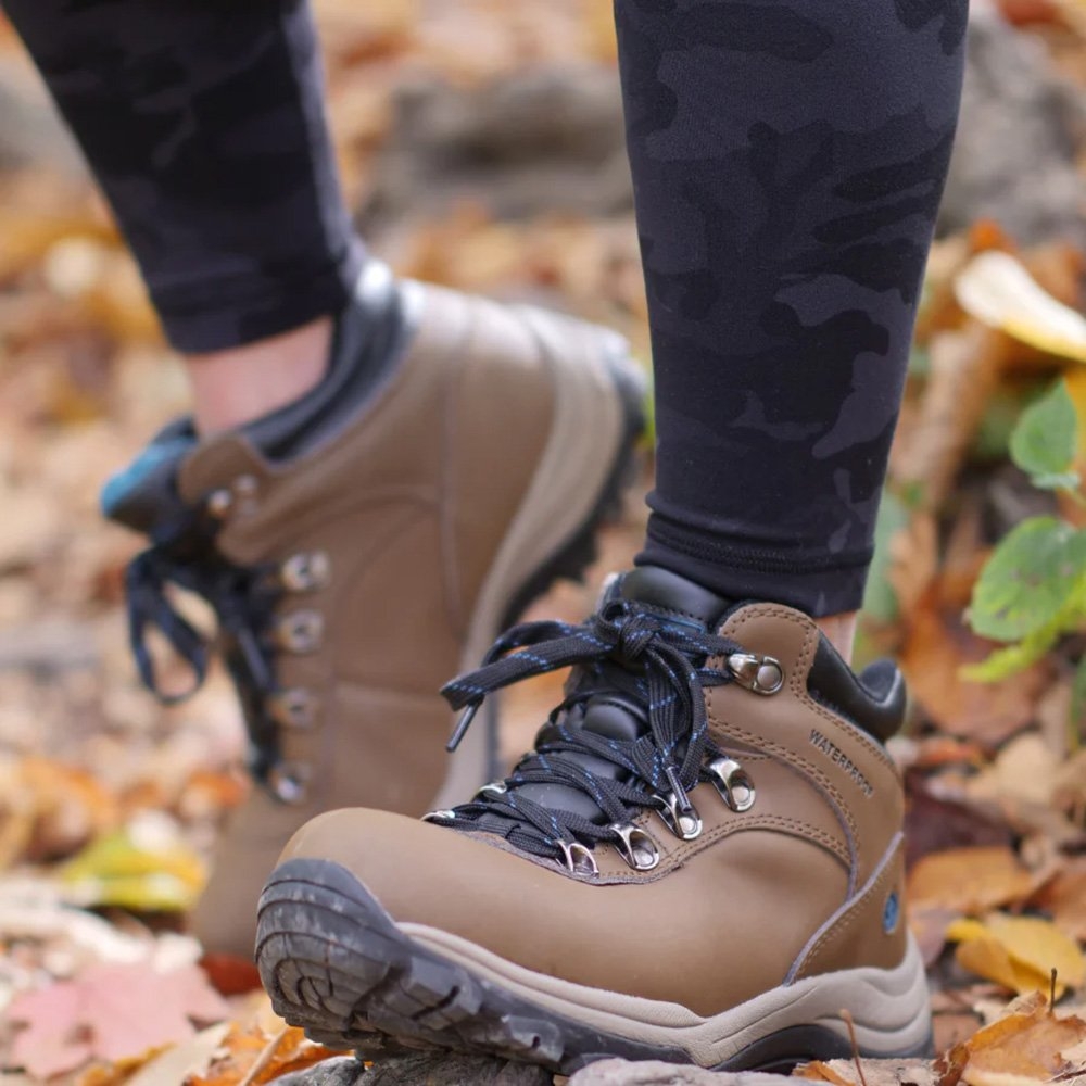 Northside Apex Lite women’s mid hiking boots in brown and teal featuring waterproof leather construction rugged traction outsole cushioned ankle support and durable outdoor trail design