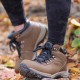 Northside Apex Lite women’s mid hiking boots in brown and teal featuring waterproof leather construction rugged traction outsole cushioned ankle support and durable outdoor trail design
