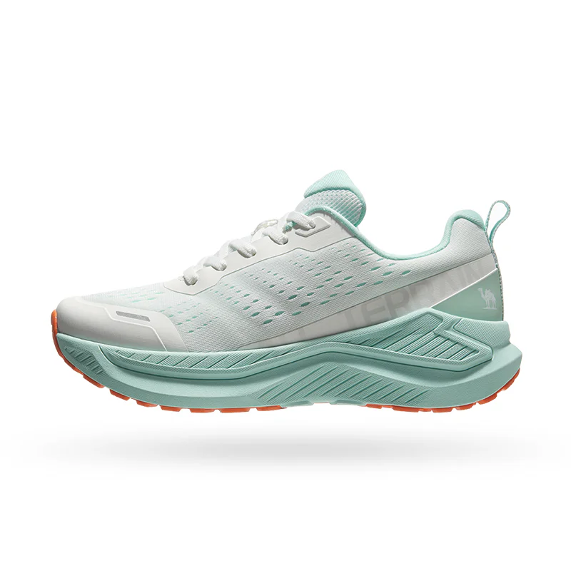 Camel running shoes in mint green and white with breathable mesh upper, cushioned sole and orange outsole detailing.