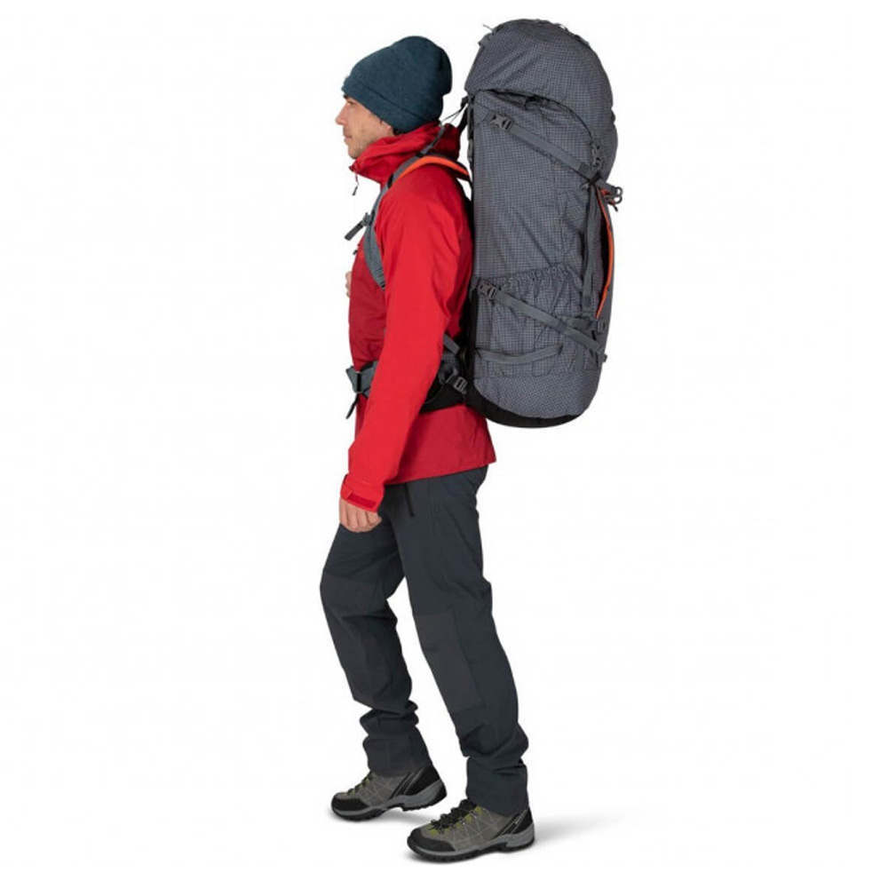 Front view of the Osprey Mutant Nimsdai 90L Mountaineering Backpack in Tungsten Grey, size Small/Medium, showcasing its robust design and multiple attachment points for mountaineering gear.