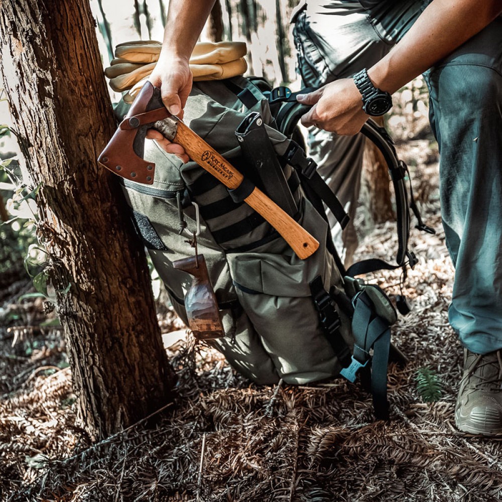 OneTigris WILD ROCKET Bushcraft Pack in rugged terrain, showcasing its durable Cordura® nylon build and multiple compartments