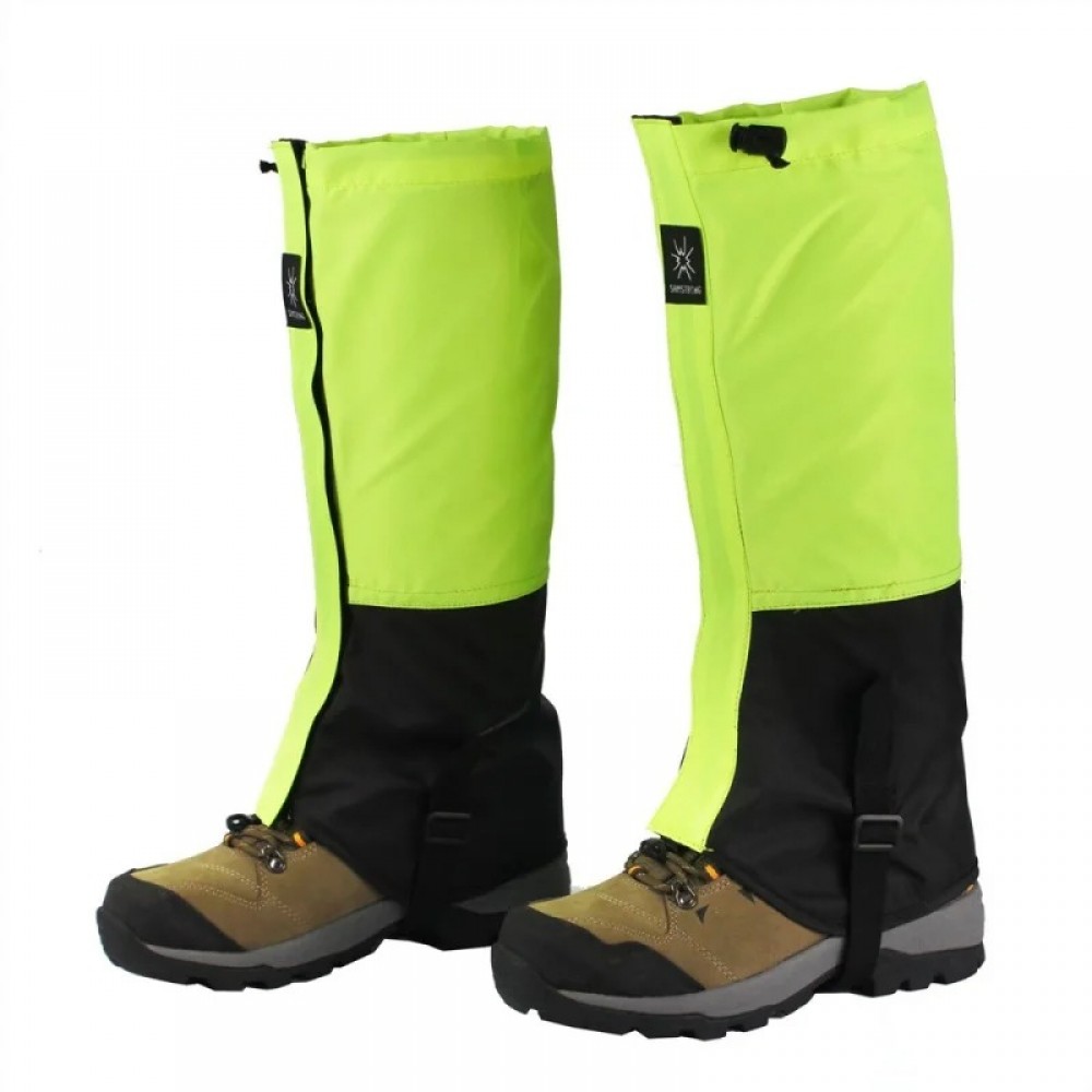 Green and grey waterproof gaiters for trekking, featuring secure hook and loop and zipper design.