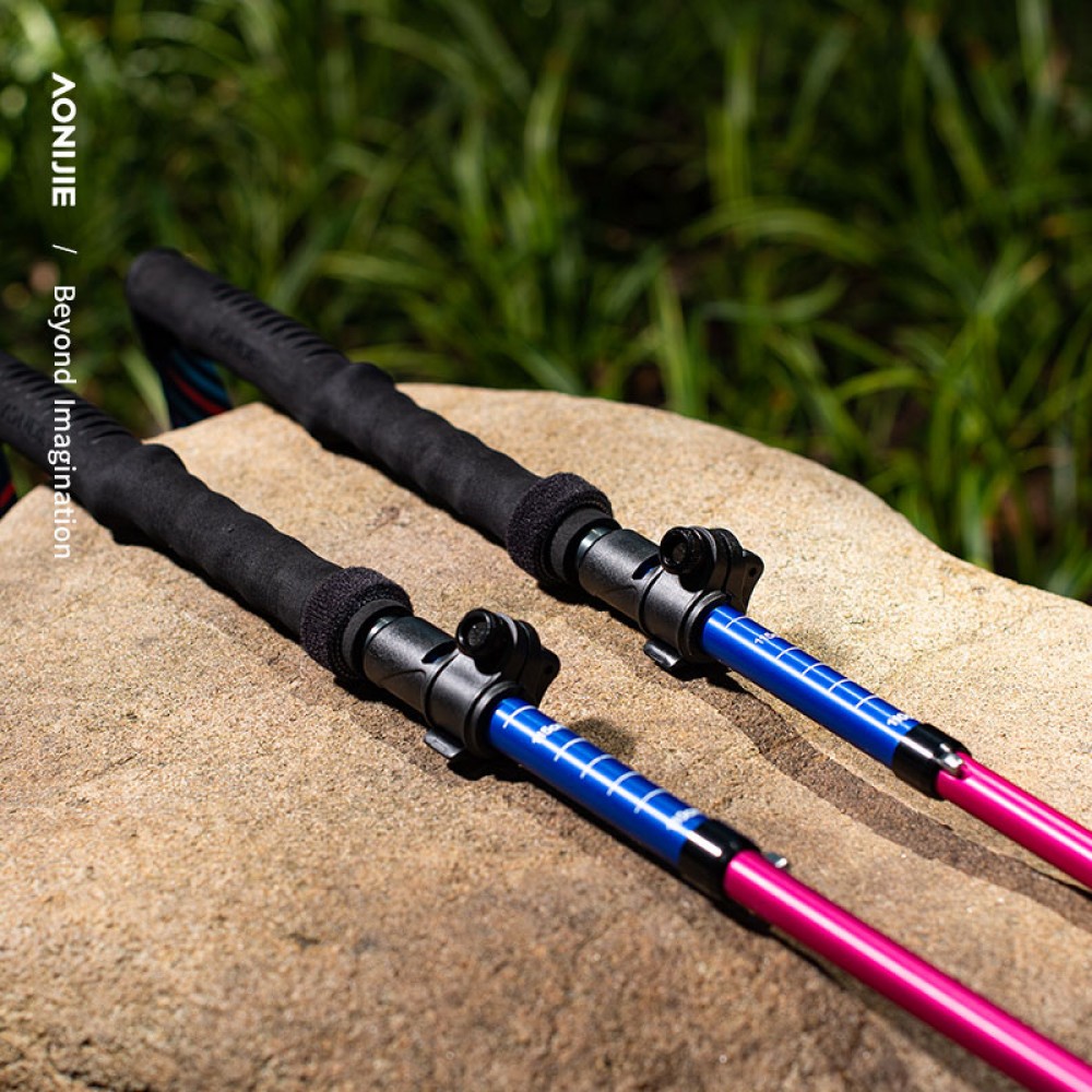 Adjustable AONIJIE hiking stick in vibrant rainbow color with EVA handle and tungsten steel alloy tip.