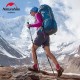 Hiker Climbing Snowy Terrain Using Naturehike ST10 Poles Hiker using Naturehike trekking poles on a snowy mountain trail.